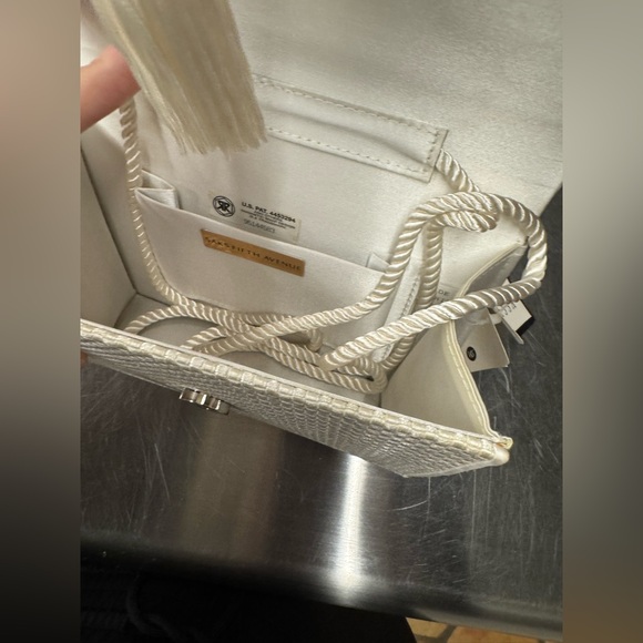 Brand new Saks Fifth Avenue satin white cross weave purse with tassel and tags - Picture 4 of 6